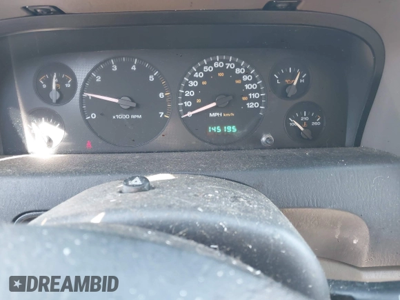 2002 Jeep Grand Cherokee z VIN 1J4GX38S92C149908, wystawiony jako IAAI lot #41782530 z przebiegiem 145 195 mil mil oraz . Historia ofert i sprzedaży dostępna na DreamBid. Obrazek 7.