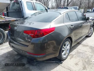 2013 Kia Optima EX with VIN 5XXGN4A77DG234921, listed as a IAAI auction lot 41823669 with 168,460 mi miles. Bid and sale history available at carsss.com. Image 4.