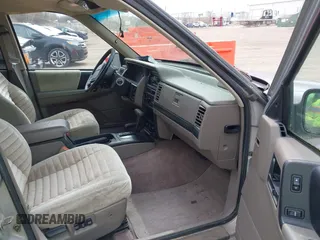 1995 Jeep Grand Cherokee Laredo with VIN 1J4GZ58S4SC532578, listed as a IAAI auction lot 41936041 with 161,777 mi miles. Bid and sale history available at carsss.com. Image 5.