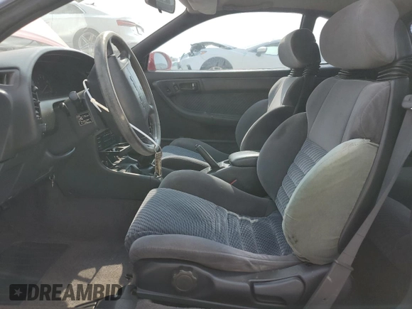 1990 Toyota Celica GTS z VIN JT2ST85N1L0018233, wystawiony jako Copart lot #56499394 z przebiegiem 180 549 mil mil oraz Szkoda całkowita • Salvage title. Historia ofert i sprzedaży dostępna na DreamBid. Obrazek 7.