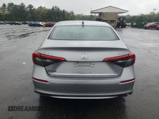 2022 Honda Civic Sport z VIN 2HGFE2F57NH597601, wystawiony jako Copart lot #55588515 z przebiegiem 12 576 mil mil oraz Szkoda całkowita • Salvage title. Historia ofert i sprzedaży dostępna na DreamBid. Obrazek 6.