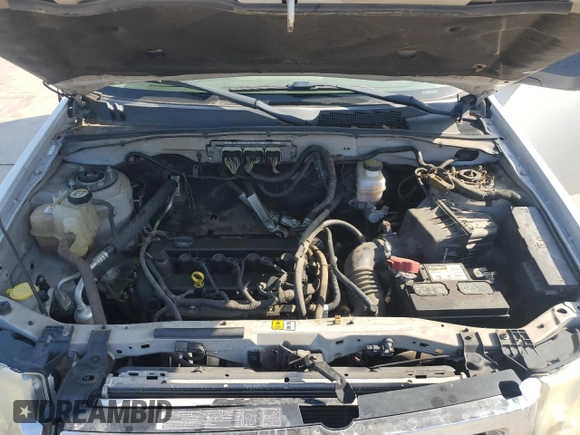 2009 Ford Escape XLS with VIN 1FMCU02719KB53740, listed as a Copart auction lot 55210035 with 144,672 mi miles and Salvage title. Bid and sale history available at DreamBid. Image 11.