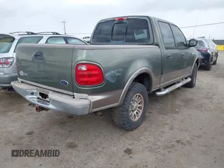 2003 Ford F-150 XLT with VIN 1FTRW08L43KC83824, listed as a IAAI auction lot 41885702 with 242,195 mi miles. Bid and sale history available at carsss.com. Image 4.