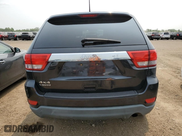 2011 Jeep Grand Cherokee Laredo with VIN 1J4RR4GGXBC567450, listed as a Copart auction lot 60056085 with 165,077 mi miles and Salvage title. Bid and sale history available at DreamBid. Image 6.