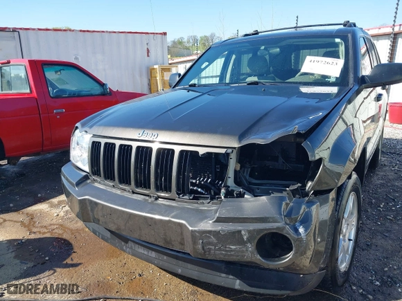 2006 Jeep Grand Cherokee Laredo with VIN 1J4GR48K56C326847, listed as a IAAI auction lot 41972623 with 141,088 mi miles. Bid and sale history available at carsss.com. Image 6.