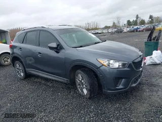 2013 Mazda CX-5 Sport with VIN JM3KE2BE7D0154040, listed as a IAAI auction lot 41842013 with 132,382 mi miles. Bid and sale history available at carsss.com. Image 1.
