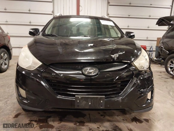 2013 Hyundai Tucson GLS with VIN KM8JU3AC0DU754948, listed as a IAAI auction lot 41811891 with 139,056 mi miles. Bid and sale history available at carsss.com. Image 12.