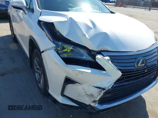 2018 Lexus RX 350L Premium z VIN JTJDZKCAXJ2006088, wystawiony jako IAAI lot #42332914 z przebiegiem 104 393 mil mil oraz . Historia ofert i sprzedaży dostępna na DreamBid. Obrazek 6.