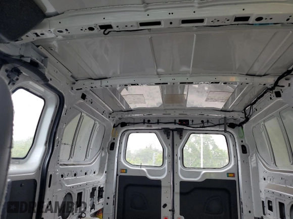 2015 Ford Transit Cargo с VIN 1FTNE1ZM7FKA40687, выставлен на аукционе Copart как лот 56940095 с пробегом 318 811 миль миль и Списание • Salvage title. История ставок и продаж доступна на DreamBid. Изображение 10.
