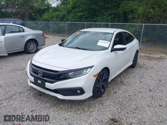 2019 Honda Civic Sport with VIN 19XFC2F85KE019311, listed as a IAAI auction lot 42319241 with 163,241 mi miles and . Bid and sale history available at DreamBid. Image 19.