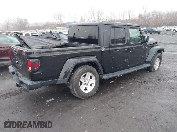2022 Jeep Gladiator Texas Trail with VIN 1C6HJTAG1NL102451, listed as a IAAI auction lot 40969999 with 69,797 mi miles. Bid and sale history available at carsss.com. Image 4.