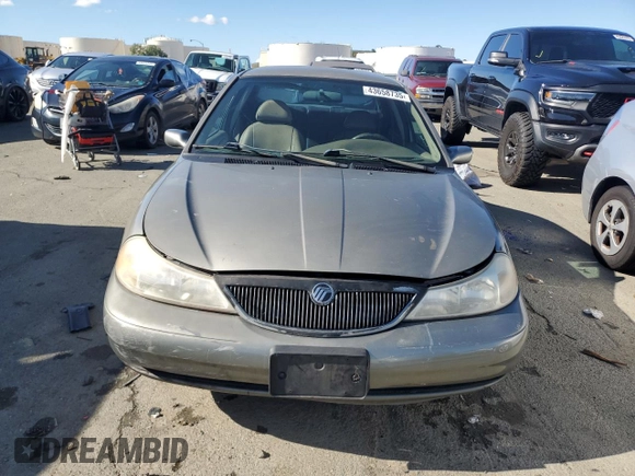 1999 Mercury Mystique с VIN 1MEFM66L5XK639295, выставлен на аукционе Copart как лот 43658735 с пробегом 130 522 миль миль и Списание • Salvage title. История ставок и продаж доступна на DreamBid. Изображение 5.