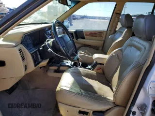 1995 Jeep Grand Cherokee Limited with VIN 1J4GZ78Y1SC529220, listed as a Copart auction lot 81247084 with 138,292 mi miles and Salvage Title. Bid and sale history available at carsss.com. Image 7.