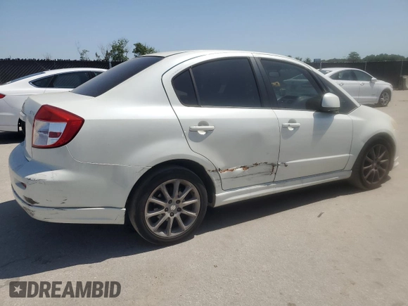 2009 Suzuki SX4 z VIN JS2YC416396200021, wystawiony jako Copart lot #56676075 z przebiegiem 150 981 mil mil oraz Szkoda całkowita • Salvage title. Historia ofert i sprzedaży dostępna na DreamBid. Obrazek 3.