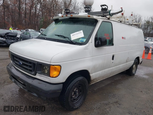 2004 Ford Econoline Cargo with VIN 1FTRE14W44HB53758, listed as a IAAI auction lot 40926124 with 139,104 mi miles. Bid and sale history available at carsss.com. Image 16.