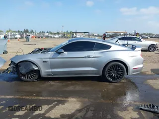 2021 Ford Mustang GT z VIN 1FA6P8CF3M5117977, wystawiony jako IAAI lot #42100989 z przebiegiem 13 557 mil mil oraz . Historia ofert i sprzedaży dostępna na DreamBid. Obrazek 15.