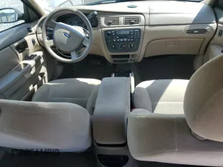 2007 Ford Taurus SE with VIN 1FAFP53U97A112369, listed as a Copart auction lot 56670245 with 95,855 mi miles and Salvage title. Bid and sale history available at DreamBid. Image 8.