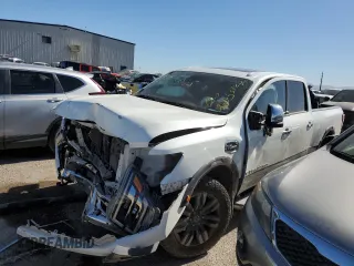 2020 Nissan Titan XD Platinum Reserve with VIN 1N6AA1FB0LN507954, listed as a Copart auction lot 80553324 with 105,207 mi miles and Salvage Title. Bid and sale history available at carsss.com. Image 1.