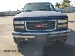 1997 GMC Suburban z VIN 1GKFK16R6VJ758513, wystawiony jako Copart lot #75034574 z przebiegiem 181 873 mil mil oraz Szkody całkowita. Historia ofert i sprzedaży dostępna na DreamBid. Obrazek 5.