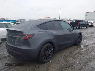 2022 Tesla Model Y Performance with VIN 7SAYGDEF1NF379167, listed as a IAAI auction lot 41429842 with 86,582 mi miles and . Bid and sale history available at DreamBid. Image 4.