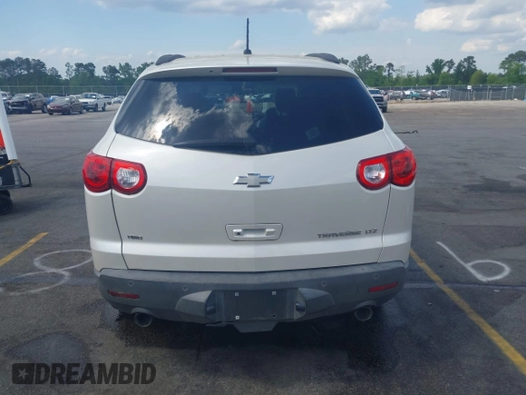 2011 Chevrolet Traverse LTZ with VIN 1GNKVLED5BJ167465, listed as a IAAI auction lot 42002979 with 167,271 mi miles and . Bid and sale history available at DreamBid. Image 16.