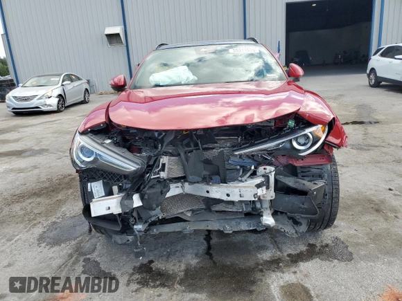 2023 Alfa Romeo Stelvio Ti z VIN ZASPAKBN2P7D65711, wystawiony jako Copart lot #55311535 z przebiegiem 32 906 mil mil oraz Nie do naprawy. Historia ofert i sprzedaży dostępna na DreamBid. Obrazek 5.