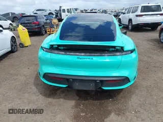 2022 Porsche Taycan 4S z VIN WP0AB2Y12NSA45396, wystawiony jako IAAI lot #41946433 z przebiegiem 9389 mil mil oraz . Historia ofert i sprzedaży dostępna na DreamBid. Obrazek 17.