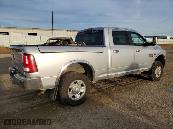 2017 Ram 2500 SLT with VIN 3C6TR5DT1HG676881, listed as a Copart auction lot 79468304 with 162,487 mi miles and Salvage title. Bid and sale history available at DreamBid. Image 3.