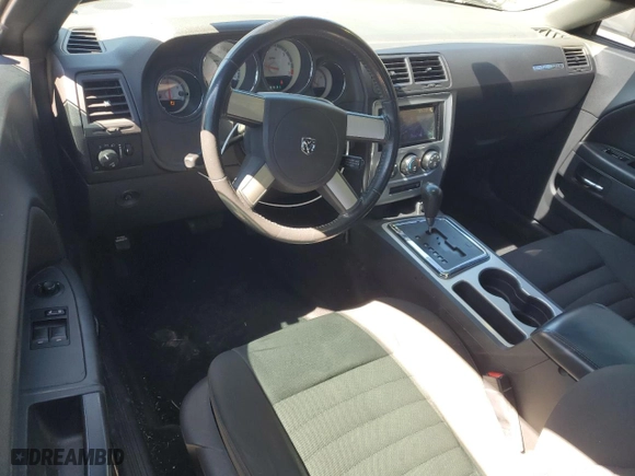 2009 Dodge Challenger SE with VIN 2B3LJ44V49H542199, listed as a Copart auction lot 50326325 with 124,536 mi miles and Salvage Title. Bid and sale history available at carsss.com. Image 8.