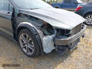 2020 Ford Fusion Hybrid Titanium with VIN 3FA6P0RU0LR141494, listed as a IAAI auction lot 39967898 with 88,152 mi miles. Bid and sale history available at carsss.com. Image 6.