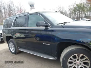 2015 GMC Yukon SLT z VIN 1GKS1BKCXFR192349, wystawiony jako IAAI lot #41842474 z przebiegiem 185 166 mil mil oraz . Historia ofert i sprzedaży dostępna na DreamBid. Obrazek 13.