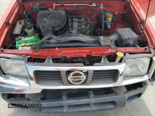 2000 Nissan Frontier XE with VIN 1N6DD26S9YC400995, listed as a Copart auction lot 58244905 with 185,488 mi miles and Salvage title. Bid and sale history available at DreamBid. Image 11.