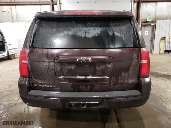 2020 Chevrolet Suburban LT with VIN 1GNSKHKC2LR210311, listed as a Copart auction lot 48062535 with 73,737 mi miles and Salvage Title. Bid and sale history available at carsss.com. Image 6.