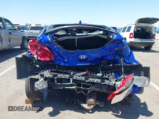 2013 Hyundai Veloster w/Gray Int z VIN KMHTC6AD3DU134956, wystawiony jako IAAI lot #42560944 z przebiegiem 108 166 mil mil oraz . Historia ofert i sprzedaży dostępna na DreamBid. Obrazek 6.