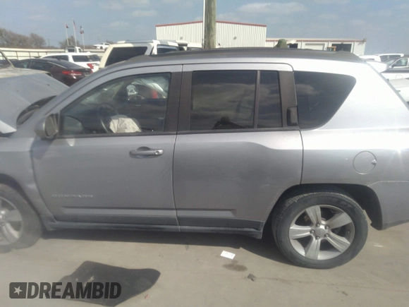 2016 Jeep Compass Latitude with VIN 1C4NJDEBXGD594149, listed as a IAAI auction lot 41523706 with 113,200 mi miles. Bid and sale history available at carsss.com. Image 15.