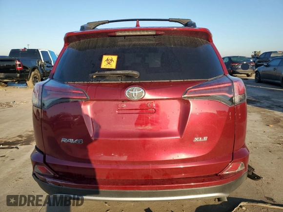 2018 Toyota RAV4 XLE with VIN 2T3WFREV4JW430404, listed as a Copart auction lot 85532074 with 118,932 mi miles and Salvage Title. Bid and sale history available at DreamBid. Image 6.