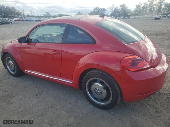 2012 Volkswagen Beetle 2.5L w/Sun PZEV with VIN 3VWJP7AT8CM637623, listed as a Copart auction lot 76350904 with 34,990 mi miles and Salvage Title. Bid and sale history available at carsss.com. Image 2.