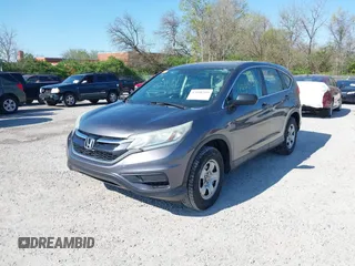2015 Honda CR-V LX with VIN 2HKRM3H31FH557779, listed as a IAAI auction lot 42098299 with 211,683 mi miles and . Bid and sale history available at carsss.com. Image 22.
