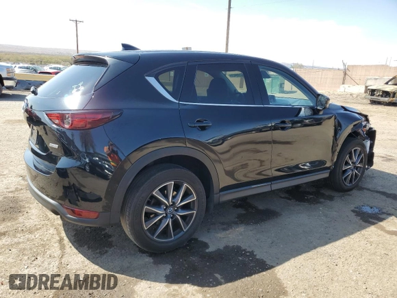 2018 Mazda CX-5 Grand Touring with VIN JM3KFADM9J1336792, listed as a Copart auction lot 52209435 with 107,852 mi miles and Salvage Title. Bid and sale history available at DreamBid. Image 3.