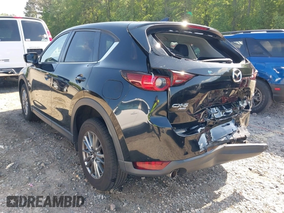 2017 Mazda CX-5 Touring z VIN JM3KFBCL0H0209458, wystawiony jako IAAI lot #42169599 z przebiegiem 93 287 mil mil oraz . Historia ofert i sprzedaży dostępna na DreamBid. Obrazek 3.