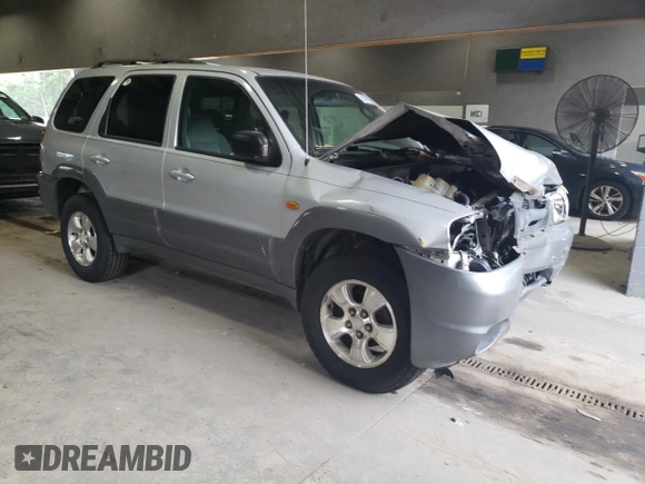2001 Mazda Tribute LX with VIN 4F2CU08141KM65160, listed as a Copart auction lot 60895624 with 255,194 mi miles and Salvage Title. Bid and sale history available at DreamBid. Image 4.