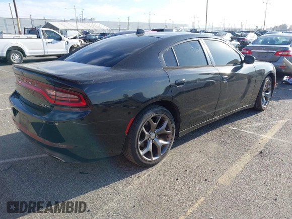 2015 Dodge Charger SXT with VIN 2C3CDXHG9FH915191, listed as a IAAI auction lot 41850427 with 164,535 mi miles and . Bid and sale history available at DreamBid. Image 4.