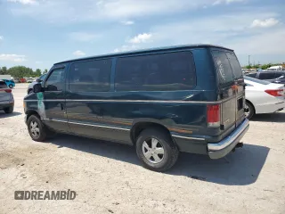 1998 Ford Econoline Passenger XL with VIN 1FMRE11L0WHA00514, listed as a Copart auction lot 64441065 with 111,243 mi miles and Salvage title. Bid and sale history available at DreamBid. Image 2.