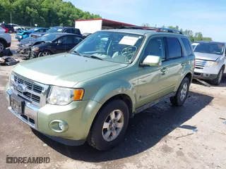 2009 Ford Escape Hybrid with VIN 1FMCU493X9KA56174, listed as a IAAI auction lot 39435925 with 158,171 mi miles. Bid and sale history available at carsss.com. Image 2.