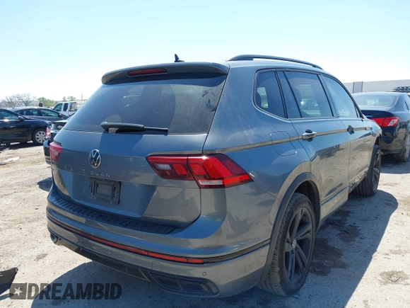 2023 Volkswagen Tiguan SE R-Line Black z VIN 3VVCB7AX1PM057201, wystawiony jako IAAI lot #41977239 z przebiegiem 84 840 mil mil oraz . Historia ofert i sprzedaży dostępna na DreamBid. Obrazek 4.