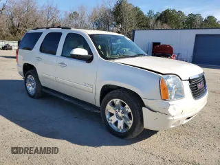 2013 GMC Yukon SLT with VIN 1GKS1CE05DR259086, listed as a Copart auction lot 42103305 with 130,079 mi miles and Salvage Title. Bid and sale history available at carsss.com. Image 4.