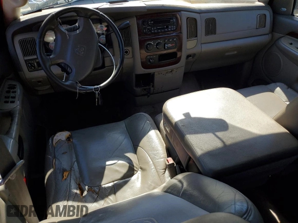 2003 Dodge 1500 with VIN 1D3HU18Z23J554985, listed as a Copart auction lot 77734174 with 193,018 mi miles and Salvage Title. Bid and sale history available at DreamBid. Image 8.