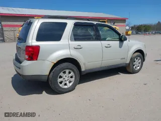 2008 Mazda Tribute Touring with VIN 4F2CZ02Z78KM05402, listed as a IAAI auction lot 42076021 with 237,405 mi miles. Bid and sale history available at carsss.com. Image 4.