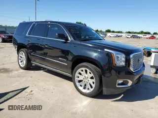 2015 GMC Yukon Denali z VIN 1GKS1CKJ8FR748131, wystawiony jako Copart lot #55213205 z przebiegiem 101 758 mil mil oraz Szkoda całkowita • Salvage title. Historia ofert i sprzedaży dostępna na DreamBid. Obrazek 4.