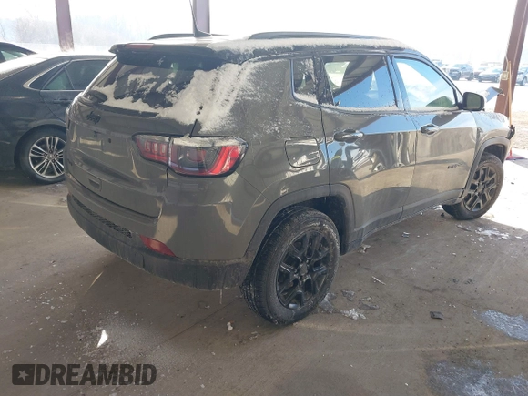 2021 Jeep Compass Sport with VIN 3C4NJDAB2MT591242, listed as a IAAI auction lot 41397874 with 64,653 mi miles and . Bid and sale history available at DreamBid. Image 4.